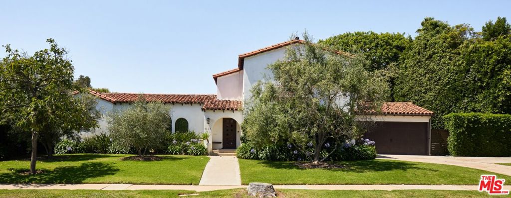 This recently, extensively remodeled, tastefully furnished 4-bedroom home sits within the Huntington Palisades, considered by many to be the most coveted area in all of the Pacific Palisades, due to its wide, flat streets, buried power lines and sidewalks and its central location -- only blocks from the wildly popular pedestrian Palisades Village (with its beloved movie theater, high street retail, and top restaurants). On ground level is the gourmet kitchen (with large center island and informal dining banquet) which opens to the spacious family room (overlooking both the front and rear yards), formal dining room and two bedrooms (one of which is currently being used as an office/den). Upstairs is the primary suite and an additional guest suite. The rear yard boasts a generously-sized pool and spa, a uniquely large grassy "play" lawn with afternoon sun all day, and a fanciful treehouse that has been built into a fully functioning office. This house is a find due to its oversized flat lot, great sun exposure and tasteful remodel. Proximate to prominent and celebrated public and private elementary, middle, and high schools; notable and luxury grocery stores; preeminent beaches; and renowned hiking trails.
