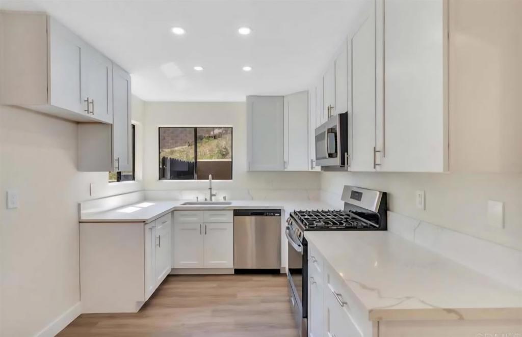 Welcome to this sexy, fully updated townhouse nestled in the scenic hills of Lakeside! This 3-bedroom, 2-bath stunner offers the perfect blend of comfort and style with a modern open floorplan, fresh finishes throughout, and plenty of natural light. Enjoy cooking and entertaining in the sleek kitchen that flows seamlessly into the living and dining areas. Step outside into your private fenced yard — ideal for pets, play, or weekend BBQs. Other features you’ll love: Updated throughout HOA only $300/mo Enclosed full yard Attached garage for parking & storage Serene setting in the hills Small complex of only 6 units Quick freeway access, lots of conveniences close — easy commute! This home has the look and the location. Don’t miss your chance to own this gem in Lakeside! Contact us at Sellstate Next Gen Realty for a private tour today!