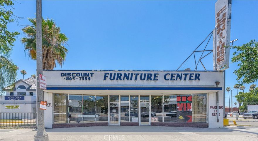 Free-standing store front with high visibility with on a street with approximately 20,000 cars passing daily.  The building consists of about 5,000 sq. ft. of retail showroom and storage space on a 6,875 Sq. Ft. lot.  The space provides the perfect setup for many uses with street and rear parking.  There is an option to divide the space into two or more separate units with two existing front door entries.  There is one single loading dock with roll up door in the rear as well as a large storage loft.  Stop renting and own your own building.  Currently owner operated furniture showroom.