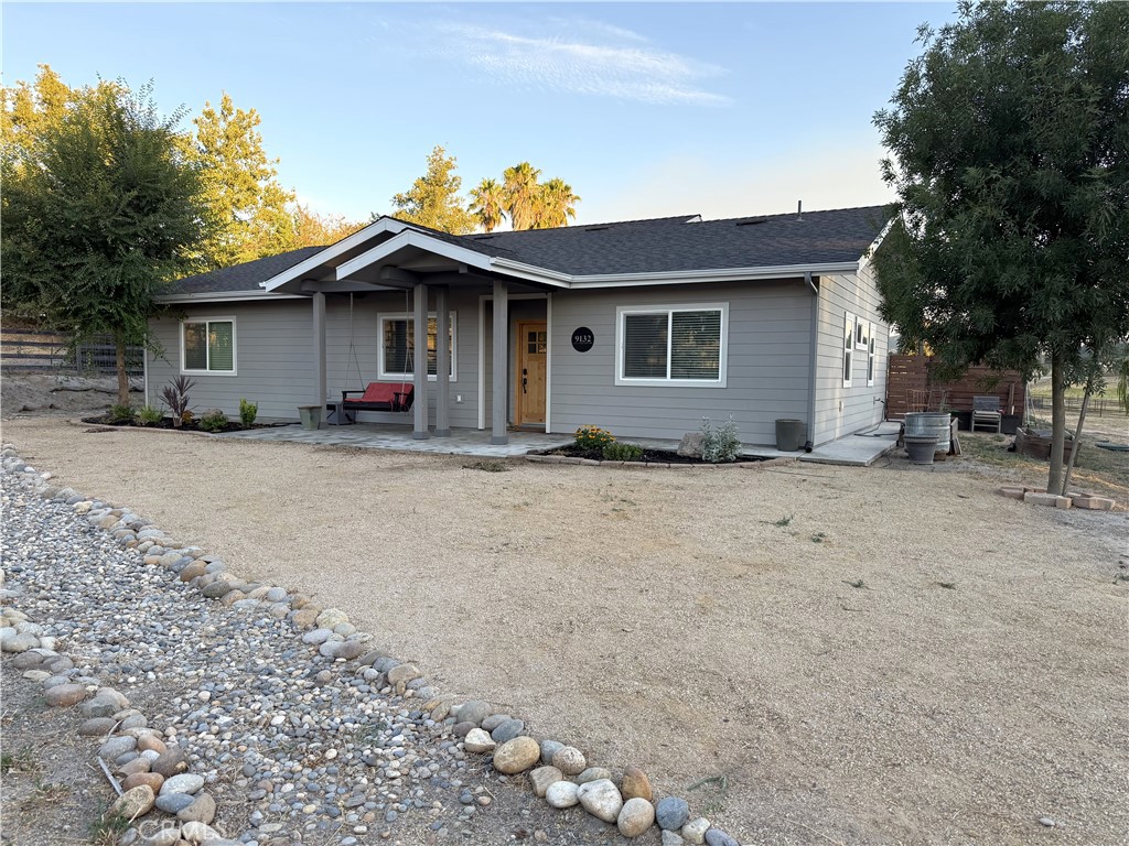 Practically new ranchette in the highly sought after Carmel Ranchos Neighborhood. Set on 1.39± private acres with panoramic views and a fully fenced perimeter (including pipe fencing around 3/4 of the property), this turnkey property combines comfort, style, and function—inside and out.
Designed with 2x6 construction and fire sprinklers, this 3-bedroom, 2-bathroom home offers 1,857± sq ft of quality living space with a new-construction feel. The open-concept floor plan features vaulted ceilings, recessed lighting, and heavily insulated walls, ensuring peace, quiet, and energy efficiency year-round.
At the heart of the home is a designer kitchen outfitted with stainless steel KitchenAid appliances—including a gas range with baking drawer, Even-Heat True Convection, and a 5-burner cooktop. Quartz countertops, soft-close shaker-style cabinets, a large center island with breakfast bar, and a tile backsplash elevate the space, while both a dedicated dining room and breakfast nook provide options for gathering.
The living room boasts a cozy fireplace and sliding glass doors that open to a fully fenced backyard retreat—complete with bistro lighting, an outdoor fireplace, stamped concrete patios, and a grassy lawn with front and rear sprinklers.
Retreat to the spacious primary suite with vaulted ceiling, a huge walk-in closet, and a luxurious en-suite bathroom featuring a dual vanity, quartz counters, rain showerhead, and soaking tub. Heated flooring in both bathrooms. Additional bedrooms are generously sized, and one even features private patio access—ideal for guests or extended family.
The oversized laundry room includes a utility sink, extensive cabinetry, and a built-in office desk. Added bonuses include a whole-house water filtration system, R/O System, tankless water heater with instant hot water, EV plug and second EV plug compatible, plus an automatic entry gate at the end of a shared driveway.
Outside, enjoy a peaceful rural setting with two horse corrals, a hay barn, and plenty of open space for expansion, animals, or RVs.
If you're seeking style, privacy, and functionality in a move-in ready home with room to breathe—this Carmel Ranchos gem is one you won't want to miss.