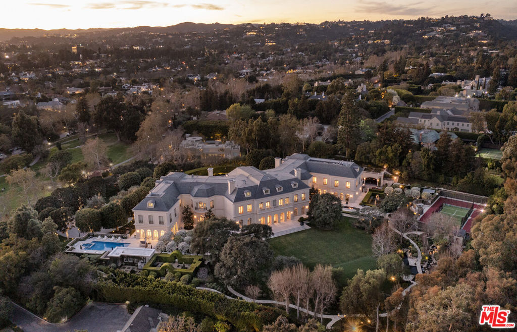 "The Manor" An unparalleled offering, an unrivaled setting, a showplace of the highest caliber. The Manor is undoubtedly one of the finest estates in the World. Majestically sited on 4.68 acres in the heart of Holmby Hills, The Manor offers complete privacy bordering the Los Angeles Country Club. Entirely clad in limestone and comprised of over 56,000sqft, The Manor offers every amenity imaginable. From bowling alleys to beauty salons, rolling lawns to rose gardens, a legendary library to professional screening room: the options are vast and endless. A rare opportunity to acquire one of the most important estates ever created.
