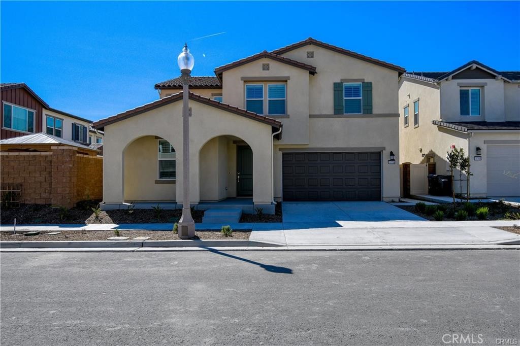 Welcome to this stunning and meticulously maintained home with solar panels, perfectly situated in one of Chino’s most desirable communities—the “Greenway” neighborhood of The Chino Preserve. This spacious residence boasts an exceptional open-concept floor plan with 5 bedrooms, 3 full bathrooms, a versatile loft, and a 3-car tandem garage equipped with an electric vehicle charging station. The gourmet kitchen is a chef’s dream, showcasing upgraded designer cabinetry, quartz countertops, a large island with ample storage, a walk-in pantry, stainless steel appliances, and custom roller shades for the sliding glass door. Plantation shutters throughout the home add a touch of elegance. Retreat to the luxurious primary suite featuring dual walk-in closets, a spa-like soaking tub, and a separate shower. Step outside and enjoy a low-maintenance front yard, while the backyard is designed for both relaxation and entertaining with a covered patio, water-saving artificial turf, and a planter area—perfect for growing herbs, flowers, or vegetables. Beyond the home, experience an unmatched lifestyle with endless amenities. Discovery Park is just steps away, offering a Tai Chi garden, tot lot, dog park, obstacle course, and basketball court. Residents also enjoy exclusive access to three clubhouses, each with resort-style swimming pools, a fully equipped fitness center, spa, sports courts, playgrounds, and community gardens. Conveniently located near dining, retail, and entertainment at The Preserve’s Town Center, and within walking distance to Legacy Academy (K–8) as well as the highly regarded Chino Hills High School, this community is a top choice for families. Come see why you’ll love calling The Chino Preserve home!