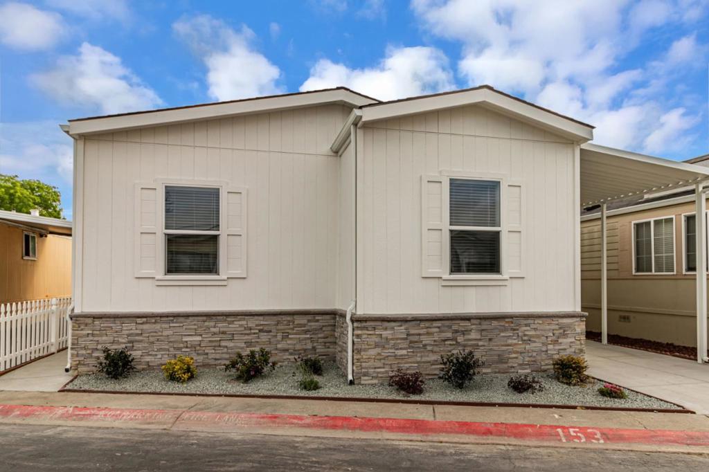 This brand new 2025 Clayton Home is 3+ bedroom, 2 bathroom and is located in all-age Rancho Santa Teresa community. Once you step inside the home you will discover a bright open floor plan, with airy living space and tasteful finishes. The kitchen features stainless steel appliances, stone quartz countertops, subway tile, a large kitchen island and plenty of cabinetry for storage. It is a split floor plan so everyone can enjoy their privacy. On one side of the home, the master bedroom has plush carpets, ceiling fan, walk-in closet, and an en-suite bathroom with double sinks and walk-in shower. On the other side, the two bedrooms are a comfortable size with great closet space. The home also has a spacious den that can easily be converted as a home office, hobby room, and much more. The community is nearby Edenvale Gardens Regional Park, Target, Lowe's Home Improvement, mass transit options, restaurants, and easy access to Hwys 85, 87 and 101