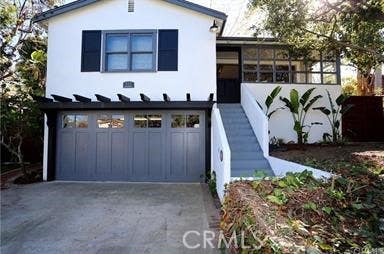 Photo of 555 Bluebird Canyon Drive, Laguna Beach, CA 92651 (MLS # LG26140767)