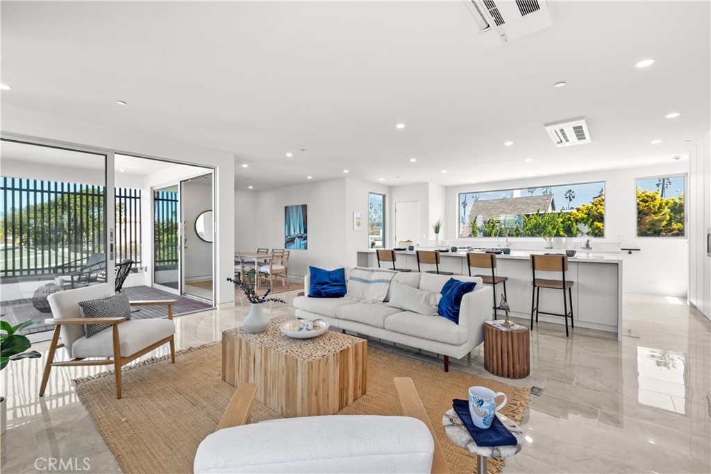 Coastline living near the beach! Welcome to 1238 Devon Lane! An amazing rental opportunity awaits. This newly build tri level 2024 custom 4 bedroom 4.5 bathroom home features many modern touches throughout and amazing panoramic views of Ventura's Oceanside area. This truly one of a kind home offers plenty of natural light that shines through the open view windows and sliding doors. Enjoy the comfort of relaxation with the view of sunrises and sunsets from the rooftop balcony! Features include tile and polished stone floors, wet bar, 2 car attached garage, inside laundry room, fireplace, top of the line appliances, large kitchen island, plenty of storage throughout, solar panels, tankless water heater and much more. The 3rd level primary suite is an experience of its own! From here you access the rooftop balcony which offers breathtaking panoramic views! The luxurious and elegant primary suite bathroom offers a spacious walk-in double shower. This is a must see for yourself! Located walking distance to the beach and Marina Park! Centrally located near Shopping, Dining, Oxnard Shores, Channel Islands and easy freeway access.