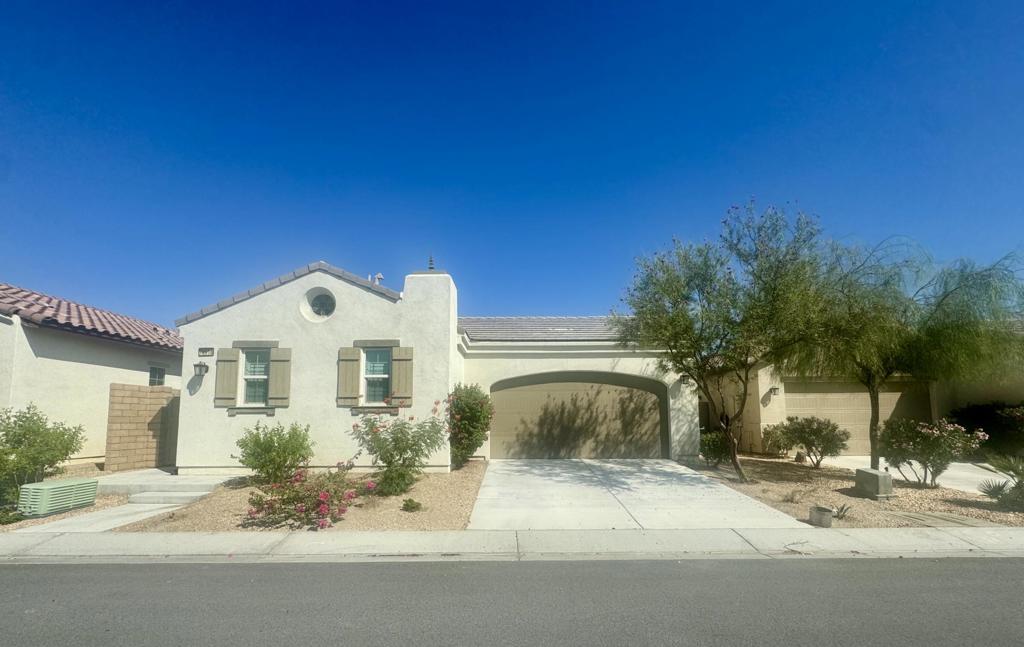 Welcome to this beautiful residence in the desirable Domani community. The open-concept layout features a spacious kitchen with a central island that seamlessly connects to the main living area--ideal for family gatherings and entertaining. This home includes 3 generously sized bedrooms, 3.5 luxurious bathrooms, separate laundry room, and a private courtyard patio equipped with electric shade covers for year-round comfort. Community pool and spa are just a few steps away!