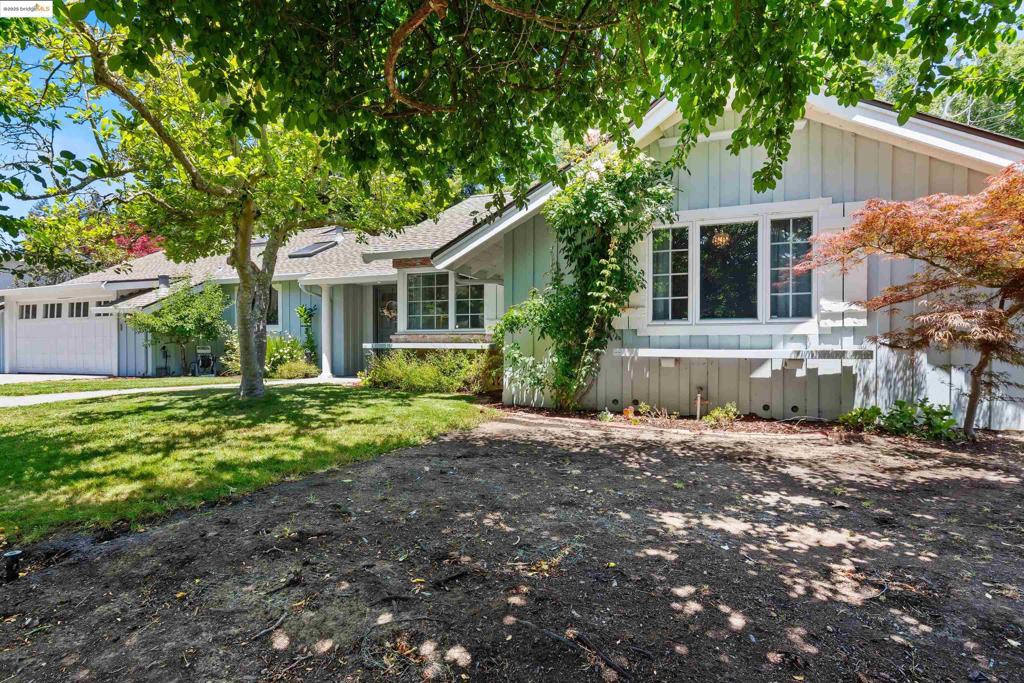 Turnkey 3-Bedroom Home on Expansive Landscaped Lot in Moraga Set on a beautifully landscaped 1/3-acre lot, this 3-bedroom, 2.5-bathroom home offers 1,685 sq. ft. of comfortable living space and owned solar for energy efficiency, and savings. Elevated from the road for added privacy, the home is perfectly positioned to enjoy tranquil surroundings in one of Moraga’s most desirable neighborhoods. Inside, you’ll find a spacious primary suite with sliding doors that open directly to the backyard, perfect for enjoying morning coffee or evening breezes. Dual wood-burning fireplaces add warmth and character to both the formal living room and kitchen. An additional family room, which also includes a convenient half bath and access to the outdoor living area. The eat-in kitchen is ideal for any culinary enthusiast, featuring a premium 6-burner Fisher & Paykel stove and plenty of natural light. The backyard is a true retreat with mature shrubs, colorful flowers, a pergola for shaded relaxation, and a charming playhouse. Additional highlights include a newer paver driveway, side yard storage, and close proximity to top-rated Moraga schools and local shopping. This move-in-ready gem combines comfort, functionality, and charm—don’t miss your chance to call it home!