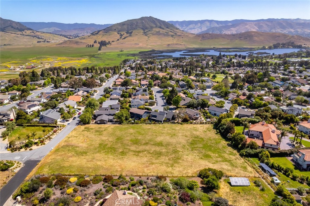 Breathtaking Views & Prime Location in Emerald Hills. Build your dream home on this exceptional 2.14-acre lot, perfectly positioned to capture sweeping views of Cerro San Luis, Bishop’s Peak, and the scenic Laguna Lake landscape. Located in the prestigious Emerald Hills community, this property offers the best of both worlds—serene hillside living just minutes from downtown San Luis Obispo. Architectural renderings are available, providing a stunning vision for what’s possible on this unique site. Enjoy easy access to golf courses, parks, hiking and biking trails, top-rated schools, charming shops, and some of the Central Coast’s finest restaurants, wineries, and beaches. This is a rare opportunity to create a custom retreat in one of San Luis Obispo’s most sought-after neighborhoods.