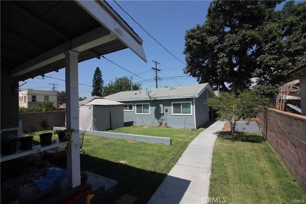 Photo of 1027 W 46th Street, Los Angeles, CA 90037 (MLS # SB25220147)