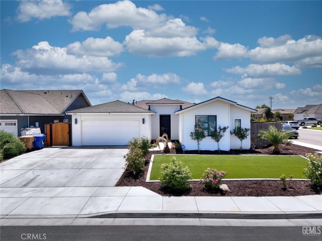 Welcome to this beautifully maintained John Balfanz home featuring 3 bed rooms 2 bathrooms plus a versatile den/office possible 4th bedroom. This home has brand new flooring throughout, offering a fresh modern feel. The front yard boasts low-maintenance turf, while the fully landscaped backyard is prefect for relaxing or entertaining. Located within walking distance to the brand-new Target and other near by conveniences, this home combines comfort, style and unbeatable location. A MUST-SEE!