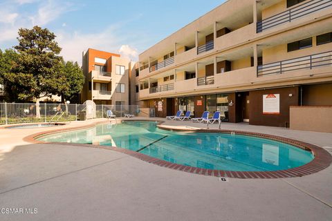 Photo of 7826 Topanga Canyon Boulevard #103, Canoga Park, CA 91304 (MLS # 226001379)