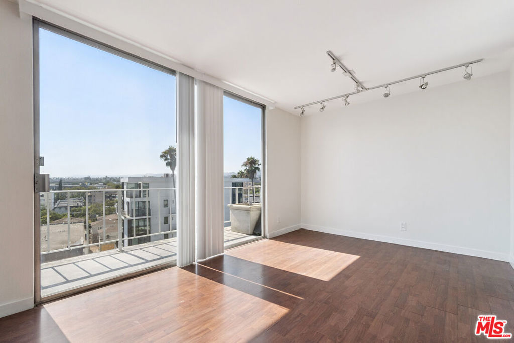 Welcome to 100 S Doheny, a luxury full-service building, where amenities include a concierge, 24hr security, a resort-style swimming pool, tennis court, and exercise room offering the comfort of a luxury hotel right at home. Step inside unit 722, a bright one-bedroom, one-and-a-half-bathroom residence bathed in natural light. Freshly painted and updated with brand-new kitchen appliances, this home offers sweeping views of palm-lined Doheny Drive and the city skyline from nearly every room, including the living room, bedroom, and private balcony. Perfectly located moments away from the Four Seasons Hotel, Beverly Center, Bristol Farms and Cedars Sinai. Nestled between the sophistication of Beverly Hills and the vibrant energy of West Hollywood, this residence offers unparalleled access to world-class restaurants, shopping, nightlife, and everything Los Angeles has to offer.