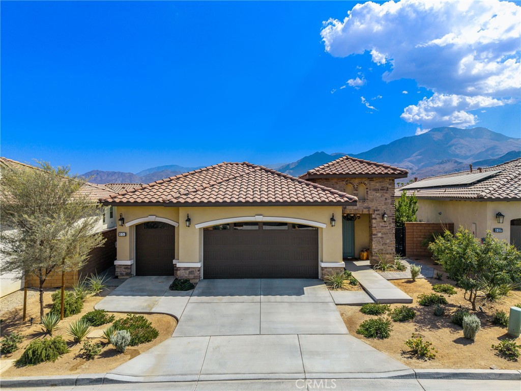 Welcome to this beautifully appointed single-story home in the highly sought-after Signature community at PGA West. This 3-bedroom, 2.5-bath residence offers breathtaking south-facing mountain views and is ideally located on one of the premier lots in the neighborhood.
Designed for comfort and elegance, the home showcases a resort-style backyard perfect for entertaining or relaxing. Enjoy a covered patio, custom Saltwater Pebble Tec pool and raised spa with water features, BBQ, and a generous grassy lawn—all set against a stunning mountain backdrop. Inside, the chef’s kitchen is a true showpiece, featuring high-end stainless-steel appliances, double ovens with built-in air fryer, a refrigerator with built-in Keurig coffee maker, and an oversized granite waterfall island. The spacious living room is enhanced by custom cabinetry and provides sweeping views of the brand-new pool and spa. Additional highlights include builder upgrades such as custom lighting throughout, a full two-car garage, and a separate golf cart garage. Residents of the Signature community enjoy exclusive access to a private clubhouse, state-of-the-art fitness center, resort-style pool and spa, BBQ areas, and world-class golf and tennis facilities. All this, just a short walk from the acclaimed Ernie’s Restaurant. Investment Opportunity: Signature at PGA West is one of the few communities in La Quinta with detached homes that are zoned for short-term rental (STR) permits—a rare opportunity to generate income during festivals and throughout the year. Don’t miss your chance to own a piece of luxury in one of the Coachella Valley’s most desirable destinations.