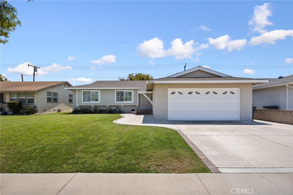 Welcome to your private poolside retreat in Buena Park! This charming single-story home offers 3 spacious bedrooms, 1 beautifully updated bathroom, and a thoughtfully designed layout that maximizes every inch of space. From the moment you arrive, you’ll notice the tranquil tree-lined street and the inviting curb appeal. Inside, the bright living room features a cozy fireplace and flows seamlessly into the dining area and open-concept kitchen, where a picture window frames the lush backyard view. Step outside to your entertainer’s paradise—complete with a sparkling pool, mature landscaping, and a covered patio ideal for weekend barbecues or relaxing evenings. The full bathroom includes a jetted soaking tub, perfect for unwinding. With a 2-car attached garage, newer finishes, and a move-in-ready condition, this home is a rare find. Located near parks, shopping, and schools in a quiet and established neighborhood. Don’t miss this Buena Park gem!