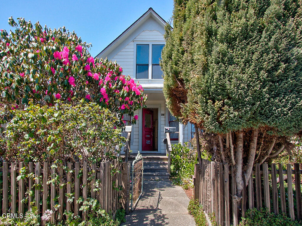 First time on the market since 1977. This cherished, family-owned property has been lovingly maintained over the decades, preserving the timeless charm of a turn-of-the-century home. The warmth of original redwood wainscoting and trim in the dining and kitchen areas adds to its character, and you can still feel the joyful energy of gatherings past.The main residence was thoughtfully converted into two units in the early 1970s. The upper level features a one-bedroom apartment with its own private entrance, while the main level offers a two-bedroom, one-bath home with a basement cellar.Nestled at the heart of the property is a bright and spacious 624 sq. ft. studio with a half bath. Once a frame shop, this versatile space is on its own commercial PG&E meter and enjoys peaceful garden-level views.Additional features include a 660 sq. ft. one-bedroom apartment located above the garage and convenient off-street parking via the alley. All units share a single water/sewer meter.This unique and versatile property offers a rare opportunity to own a piece of local history, full of character and potential.