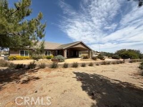 Photo of 7031 Joshua Rd, Oak Hills, CA 92344 (MLS # HD26089172)