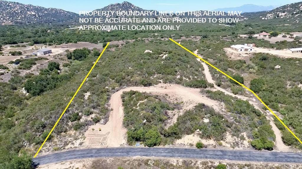 Nestled in the heart of Mt Olympus Estates, this stunning 10-acre parcel offers a rare opportunity to build your dream home or ranch in a peaceful, panoramic valley. Surrounded by majestic mountains and scenic rock outcroppings, the property enjoys sweeping views of Gomez Creek and a tranquil, natural setting. The land features flat to gently sloping terrain with a slight rise, perfect for a future homesite. Enjoy the convenience of a 24-ft wide paved road, underground power and water at the property, and a 3-bedroom septic layout already on file. With dual access points, this lot is ideal for horses, outdoor living, and all your toys. Mt Olympus Estates offers a blend of seclusion and accessibility—just minutes from I-15, yet a world away in peaceful ambiance. This is a rare blank canvas to create the lifestyle you’ve always envisioned.