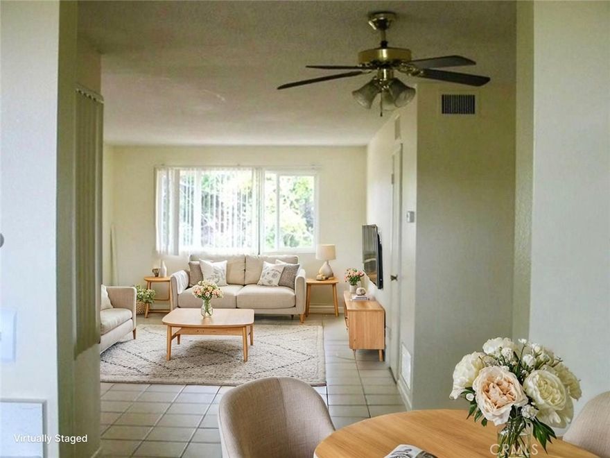 Nestled in a highly desirable West Hills location, this charming, second floor two bedroom two bathroom unit offers comfort and convenience. Its features include spacious and bright living room and dining room area, remodeled kitchen and bathrooms, bedrooms with closets with mirrored doors and two car garage for secure parking and extra storage. There are only four units in the building. It is situated directly across from a popular shopping center, you'll have easy access to Trader Joe's and many other shops and restaurants. The front porch offers a perfect spot to unwind while taking in the lively energy and scenic view of the shopping center across the street. With great schools in the area and all the great features, this unit is truly a rare find.