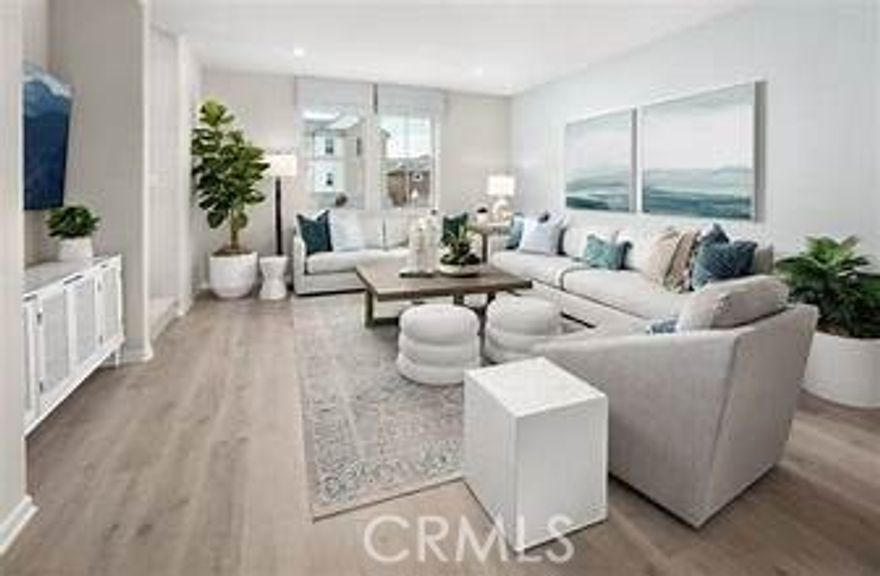 Highly upgraded townhouse ! Wood Floors, High Quality Window shutters , and extra modern ceiling and kitchen lights. This 3-story home gives you the space you need , with energy efficiency and modern layout top of mind. Downstairs, a private bedroom with full bath is perfect for guests, roommates, or a quiet office space. The main floor features an open layout with a bright Great Room, modern Kitchen with island, walk-in pantry, and adjacent Dining area. The private deck, ideal for enjoying some fresh air. Upstairs, you'll find three additional bedrooms, including a comfortable Primary Suite with walk-in closet and dual-sink bath, plus a separate Laundry Room with optional side-by-side setup. Thoughtfully designed with smart storage and flexible living spaces, this home also includes a 2-car garage, tankless water heater, and dual-zone HVAC. Built by Beazer Homes — the nation’s #1 builder of DOE-certified Zero Energy Ready Homes — this home is built for better comfort, energy savings, and cleaner indoor air with its Indoor Air Plus certification. Walk across the street to the Meadow Club house, complete with an event room, fitness center, outdoor bar, fireplace, BBQ, pickleball, basketball, tot lot, and dog park! (Some Photos are from Model Home)