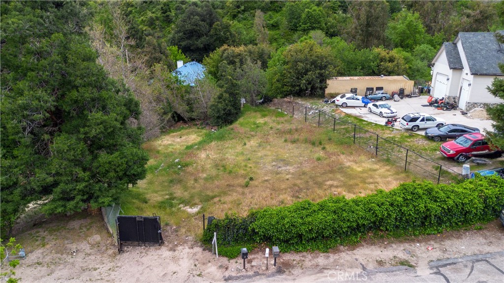 Welcome to this peaceful, parcel of land nestled in the scenic hills. Just minutes away from Crestline, this property is located within easy access to the charm of the mountains while still being close to local amenities and the 210/215 freeways. Enjoy fresh mountain air, abundant wildlife, and stunning views. This land offers the perfect setting for outdoor living and relaxation with utilities nearby.