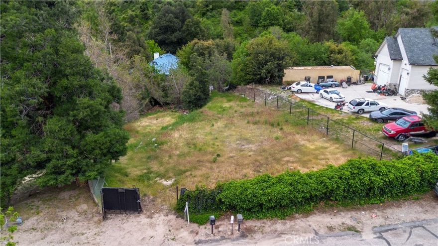 Welcome to this peaceful, parcel of land nestled in the scenic hills. Just minutes away from Crestline, this property is located within easy access to the charm of the mountains while still being close to local amenities and the 210/215 freeways. Enjoy fresh mountain air, abundant wildlife, and stunning views. This land offers the perfect setting for outdoor living and relaxation with utilities nearby.