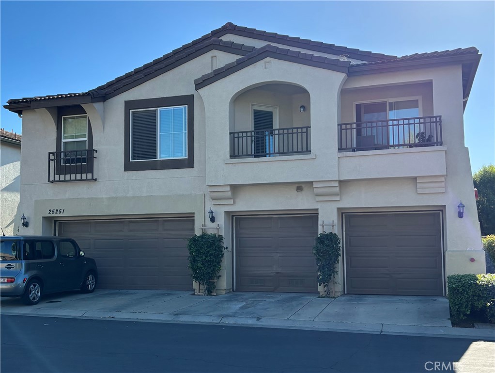 Welcome to Meadowlane, a beautifully maintained gated community in Murrieta. This charming 2-bedroom, 2.5-bath condo is quietly situated toward the back of the complex, offering privacy and a peaceful setting. The inviting main level features a bright living room, a cozy dining area, and a spacious kitchen with ample counter space and storage. A convenient half bath is also located downstairs. From the dining room, sliding glass doors open to a private, fenced patio—perfect for outdoor relaxation, entertaining, or enjoying your morning coffee. Upstairs, you’ll find two spacious primary suites, each with its own private bathroom. The main suite includes a walk-in closet, dual sinks, and a shower/tub combo, while the second bedroom offers generous closet space and an ensuite with a single vanity and tub/shower combination. Additional features include an attached one-car garage with direct access, washer and dryer hookups, and guest parking nearby. Meadowlane is a gated community with beautifully landscaped grounds, a sparkling community pool, and easy access to local shopping, dining, and entertainment. Conveniently located near the 15 and 215 freeways, this home offers an easy commute to nearby Temecula Promenade Mall, Old Town Murrieta, and Temecula’s popular restaurants and recreation.