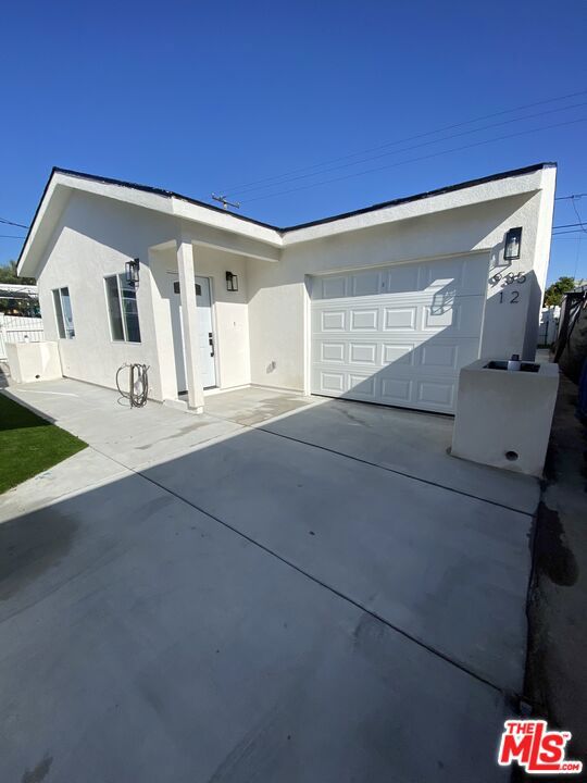 Located in northern Inglewood this light and bright 3 Bed 2 Bath ADU is just for you! Your new home features an open kitchen/living concept furnished with all fixtures including a refrigerator, dishwasher, stove, and microwave. In the hallway towards the living quarters, you will find a washer & dryer. Past that to the left is bedroom 1, followed by a full main bathroom and then bedroom 2. On the right you have the primary bedroom with en suite and walk in closet. Sliding doors lead to a private backyard space. This home also includes central heating & cooling plus recessed lighting and laminate hardwood throughout. Last but not least, there is a 300sqft attached garage that is all yours as well! Make an appointment to tour this wonderful home today.