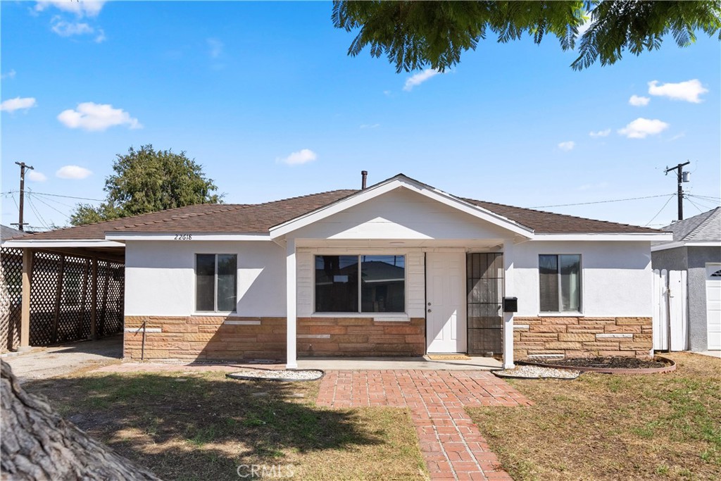 Welcome to 22618 Island Avenue, a beautifully refreshed home on a spacious lot in Carson. This single-level, 3-bedroom, 1-bath residence has been thoughtfully updated and is move in ready.
Inside, you will be greeted with brand new luxury vinyl plank flooring, freshly painted walls and lots of natural light. This home has three generous sized bedrooms each with plenty of closet space and smooth ceilings. The remodeled bathroom features subway tile and modern finishes, while the kitchen offers freshly painted cabinets, plenty of storage, and a brand-new stove that’s ready for your first home cooked meals. This home also has inside laundry to keep daily living convenient.
Step outside and marvel at the large backyard with endless potential. Imagine summer barbecues, or adding a pool, or even an ADU. The covered carport and long driveway give you plenty of parking and flexibility.
All this, plus a central location near parks, shopping, and freeway access that makes commuting and weekends a breeze.
If you’ve been waiting for the right place to make your move into homeownership, 22618 Island Avenue is it. Fresh, affordable, and full of potential.