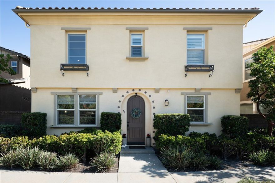Welcome to this exceptional 3-bedroom, 2.5-bathroom single-family home offering 1,921 sq. ft. of stylish living in the highly sought-after Citron neighborhood of Rancho Mission Viejo. This unique residence boasts a private front entrance with serene hillside views right from your doorstep.  

Inside, an open and airy layout is highlighted by soaring two-story ceilings, gorgeous engineered hardwood floors, plantation shutters, and custom window shades. At the heart of the home, the oversized kitchen island with quartz countertops provides the perfect gathering space for cooking, dining, and entertaining. The kitchen is further enhanced with a marble backsplash, Whirlpool stainless steel appliances, crisp white shaker cabinetry with soft-close drawers, and abundant pantry storage. Counter seating offers a spot for casual meals, while the adjacent dining area is ideal for larger gatherings.  Upstairs, the primary suite serves as a relaxing retreat with a spa-inspired en-suite featuring dual vanities, a soaking tub, a separate walk-in shower, and a generous walk-in closet. Two secondary bedrooms connected by a pass through bathroom, plus a convenient laundry room with sink, overhead cabinetry, and folding counter, complete the second floor.  Perfect for indoor-outdoor living, the home also features two upgraded backyard patios with stamped concrete—ideal for entertaining, relaxing, barbecuing, or playtime with pets.  Residents of Esencia enjoy an unmatched lifestyle with access to resort-style amenities, including multiple clubhouses, 8 pools, 3 state-of-the-art gyms, sports fields, a dog park, community farms, scenic hiking trails, tennis and pickleball courts, the Boulder Pond, Camp Out facility, and more. Families will love the close proximity to the award-winning Esencia K-8 School.  With a prime location just 15 minutes from the beach and quick access to the 241 and 5 freeways, this home truly captures the best of Southern California living.