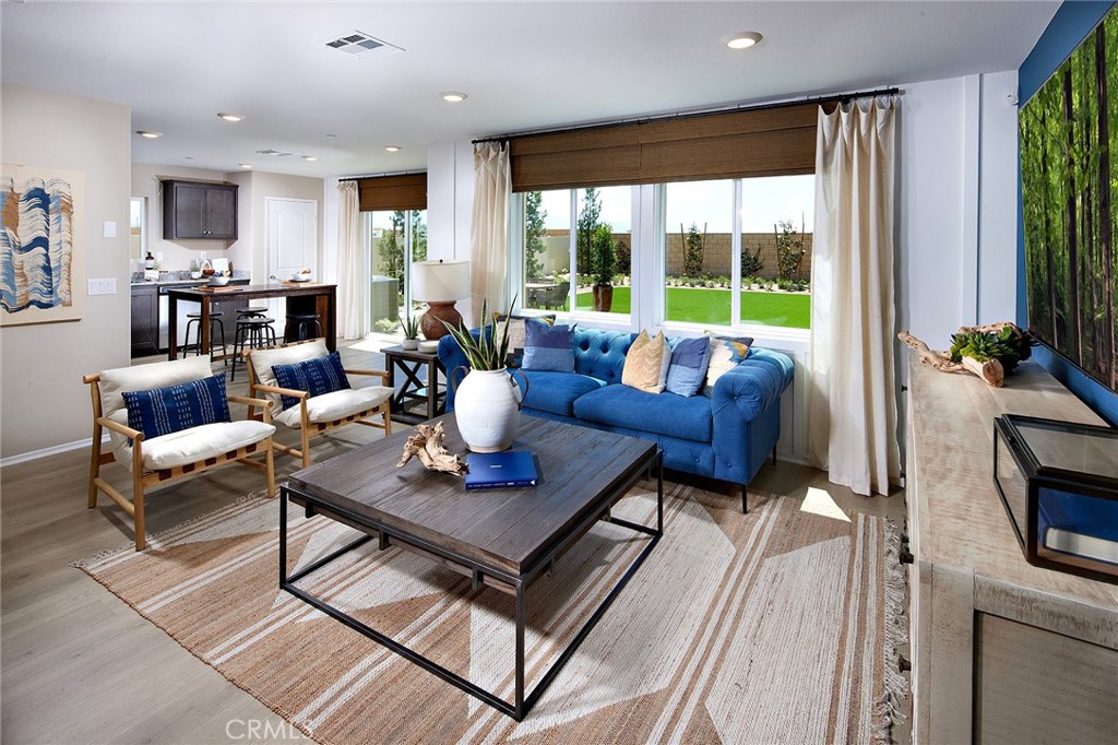 NEW CONSTRUCTION - SINGLE-FAMILY HOMES - The wait it over - SENECA POINTE IV is now open and offering a stunning collection of single-family homes ranging from1,775 sq. ft. to 1,874 sq. ft. in the city of Adelanto. This Residence 1874 wows from the first look with a welcoming front porch and an elegant, long entryway that sets the stage for the amazing, open concept Great Room and large eat-in, gourmet Kitchen with stylish cabinetry, granite counter tops, brand, new stainless-steel appliances and pantry. The additional, spacious Main Floor Bedroom and Full Bath offer a convenient space for guests, as a home office or bonus space. Upstairs, an enormous Loft lends a perfect space for studying, movie night or just lounging. The additional, generously-sized extra Bedrooms and Bath with dual sink complement the space. The Primary Suite is a welcome refuge from the day, offering an expansive space to relax and unwind while the Primary Bath offers an oversized shower, dual sink vanity and amazing walk-in closet. Desert skyscape watching and entertaining will abound in the large backyard space just waiting for your imagination. Other amazing features include "Americas Smart Home Technology" for Home Automation at your fingertips, LED recessed lighting, tank-less water heater and much more.