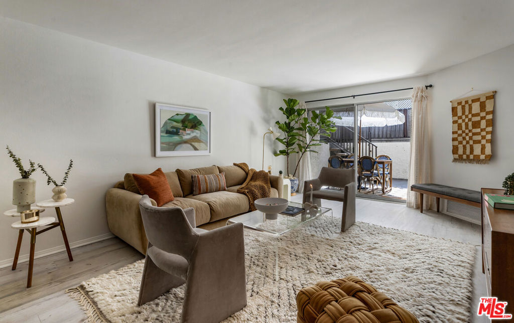 Welcome to this bespoke unit in Sunset Plaza/West Hollywood. You will be on vacation every day with these resort amenities. Everything about this sun filled 1 bedroom, 1 bath unit in the complex is stellar, including the fact that your parking space is right next to the unit which you can get to with a few steps or an elevator allowing amazing access that is rare. You have arrived. As you enter the unit, you step into paradise. This rare find includes a spacious dining room with raised ceilings. The stunning kitchen includes updated stainless-steel appliances (microwave, dishwasher, range and fridge). White Oak wood countertops flank the kitchen with a breakfast bar that works as a great pass through to entertain your guests as they enjoy the living and dining rooms that seamlessly open up to an intimate private patio. Through the bedroom, you fill find an abundance of storage including a walk-in closet. The bathroom includes updated vanity and separate shower and tub. Other features include recessed lighting and central HVAC. Did we forget to mention? Yes, we did, space for a full-sized side by side washer/dryer. You could not ask for more with this superb location. Steps to the historic Sunset Strip with ample parking for your guests. Our favorite note is the Supreme store at the corner where the drops might take you in for a quick snap from top designers. Not your vibe? Then you have the brilliant Dialog Cafe to enjoy your morning coffee. Stroll down to Book Soup where famous authors speak and cozy up to the offerings there. Nightlife is plentiful with the likes of the Whiskey & Roxy. Put on your platforms and head down to Santa Monica Blvd/WEHO with its vibrant nightlife scene including The Abbey and dance the night away. There is something for everyone living at Horn Plaza. Horn Plaza's resort-style amenities include a hillside pool and rooftop sun deck, spa, sauna, club room, rooftop deck, dog run, and abundant guest parking. The secure building offers controlled entry, security cameras, a secured mailroom, and an onsite manager for added peace of mind. Don't miss this chance to own in one of West Hollywood's most coveted buildings!