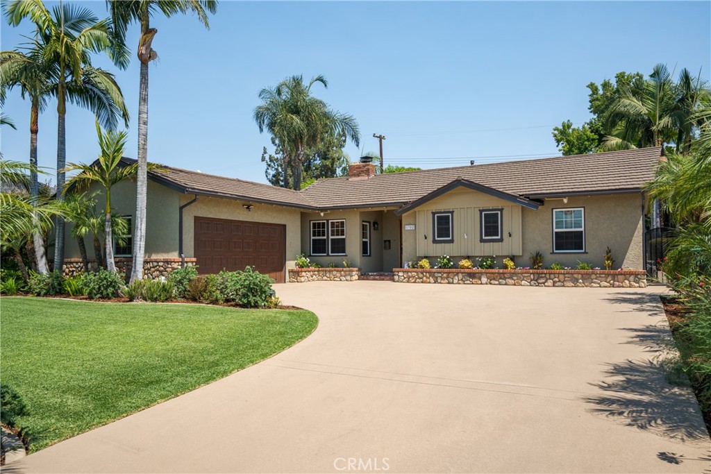 Absolutely Stunning! Entertainer's Dream Home! Hidden Glendora Gem near the Glendora Country Club. Beautiful tree lined street and amazing curb appeal. Single story Glendora pool home with views of the mountains. Just in time for summer to enjoy the pool/spa and tropical landscaping. This home features 3 bedrooms, 2 bathrooms, living room with engineered wood flooring leading to the patio and backyard dream, real stacked stone gas fireplace and added ceramic log kit for those cold nights, kitchen with stainless steel appliances, including a 6 burner Thor stove/oven, kitchen Aid dishwasher and refrigerator, tile flooring in the kitchen and a real stacked stone fireplace with custom log set and large size dining room next to kitchen. Seller has spared no expense on the remodeling and upgrades to this lovely home. Seller's remodel/upgrades include bathrooms, kitchen, flooring, recessed lighting and plantation shutters throughout, solid wood interior doors along with the front door, engineered wood flooring, tile flooring, barn door, copper plumbing, electrical panel, main water line, grey water line, solar system, landscaping and exterior lighting, garage door and opener, custom sliding door leading to backyard and pool/spa, pebble tech pool/spa, slurried driveway and back decking, Milgard dual pane windows and much more. 2 car attached garage with lots of room for parking on driveway. Award winning Glendora Schools. Near schools, freeways and shopping. A Must See!