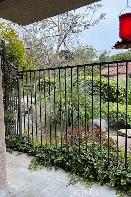 Pristine condition, highly upgraded near the pool and babbling brook, close to parking spot and garage. Secluded area of Vista Pacifica on the outer rim, small pet friendly, washer/dryer included, new refrigerator. Outstanding tile floors throughout, beautiful lighting, spa like baths.