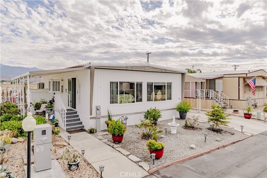 Welcome to this beautifully remodeled 2 bedroom, 2 bathroom home located in a peaceful 55+ community in San Jacinto. Perfect for seniors or anyone looking to downsize, this home sits on a desirable corner lot with stunning mountain views. Inside, you’ll find fresh paint throughout, newly installed windows, and a bright, inviting floor plan. The exterior has also been recently repainted and features a brand new patio, ideal for enjoying quiet mornings or evening sunsets.

Residents can enjoy community amenities including a sparkling pool, relaxing spa, clubhouse, and laundry facility, all while being just 4 minutes from Soboba Casino and close to shopping and dining. This move-in ready home offers comfort, convenience, and the perfect setting for a relaxed lifestyle.