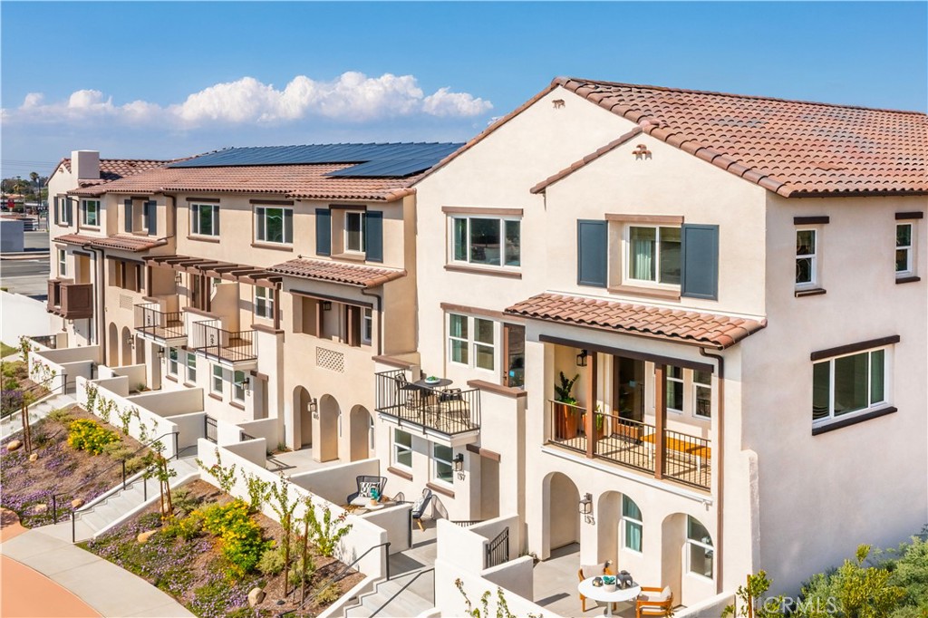 AMAZING VALUE for a brand-new townhome in the City of Claremont!!! This home is move-in ready! This fantastic Claremont location offers minutes to the charming village with boutiques, historic architecture, dining, and outdoor recreation.
This thoughtfully designed "Redwood" floorplan features a two-car garage, entryway and a great space for a work from home office on the first level. The second floor is your main living level and features a spacious kitchen with large eat-in island, an open living room, a full bedroom/bath and a large outdoor deck. On the upper level you'll find a conveniently located laundry room, your large primary suite with walk-in closet and a secondary bedroom with its own walk-in closet and private en-suite bath.