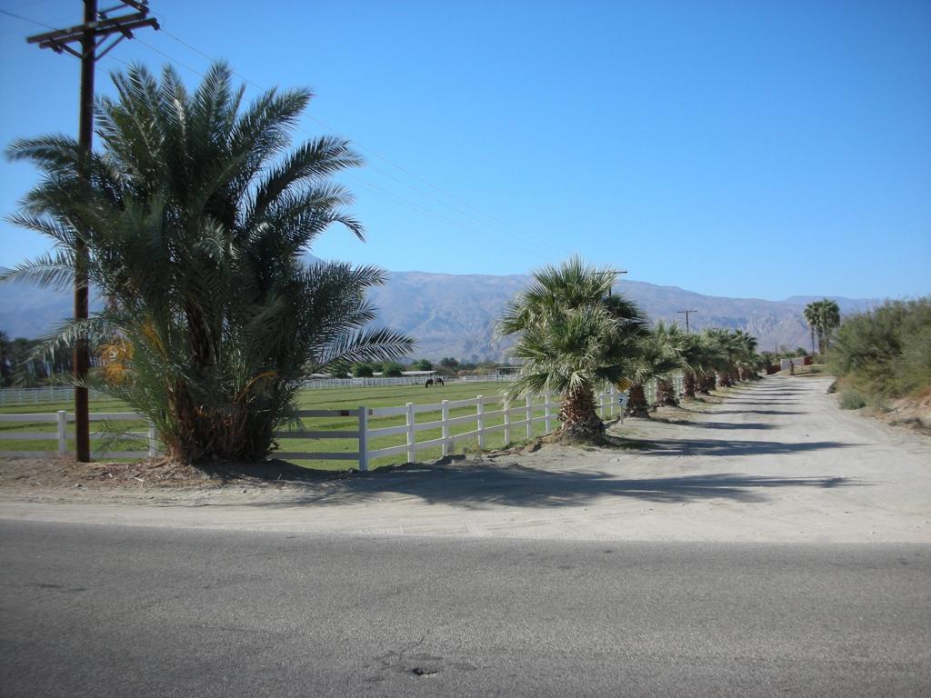 Great potential development with incredible views of the Santa Rosa Mountains located in the Vista Santa Rosa Area approximately 900 feet south of Avenue 58 on the westside of Jackson Street. Located in an Opportunity Zone and Under the City of La Quinta sphere of influence allowing for a low density residential development near major country clubs such as The Madison Club, Andalusia, The Palms, PGA West, Trilogy and many more. Also the ranch is located within 3 miles of the Desert International Horse Park and the Coachella and Stagecoach Music Festivals.There is a sewer line located at the corner of Jackson Street and Avenue 58, IID currently provides electric to the property, a domestic water well provides water to the homes, horse facilities, and lawns at the homes. In addition there is Canal Water and a standpipe system providing water for farming and horse pastures for the entire property. The horse facilities include an arena, round pen, 10 stall mare motel, six horse corrals, three wash rack areas, storage barn, small storage rooms around the ranch, and ten acres of beautifully fenced pastures.Finally there are multiple rental homes on the property and between these rentals, the pasture revenue, horse boarding, and farming the monthly gross income is a little over $8,000 per month.