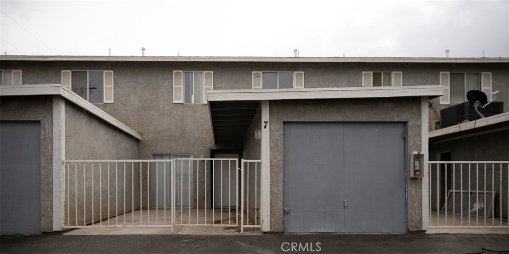 2 story 2 bedrooms and 2 baths up. Living room Kitchen, breakfast area & 1/2 bath downstairs Private gated front patio area. Single car garage with laundry hook ups in garage. Water & Trash Paid. No pets