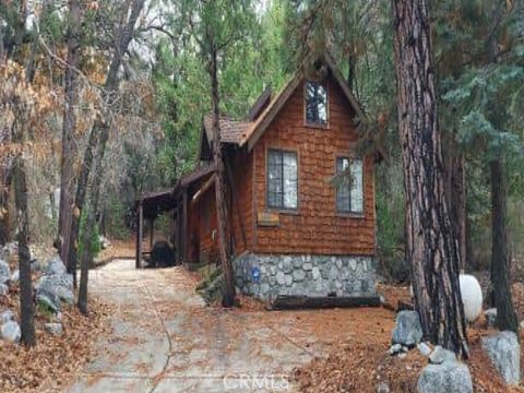 Photo of 40411 Valley Of The Falls Dr, Forest Falls, CA 92339 (MLS # IV26009209)