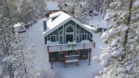 Photo of 313 Hilltop Lane, Big Bear City, CA 92314 (MLS # OC26206593)