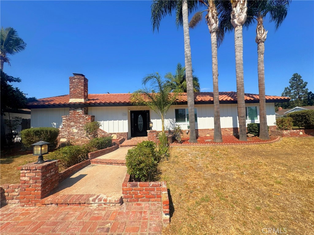 Welcome to 1321 Lance Dr, Tustin, CA 92780 – a beautifully renovated pool home on a desirable corner lot!
This stunning single-story home offers 3 spacious bedrooms and 2 bathrooms, thoughtfully updated with modern touches throughout. Step inside to find new laminate flooring, fresh interior and exterior paint, and updated landscaping that adds instant curb appeal.
The living room features a cozy fireplace, creating a warm and inviting space for gatherings. The kitchen boasts newer style cabinets, counters, and appliances, offering both functionality and style. Convenient indoor laundry makes everyday living a breeze.
The primary suite includes a private attached bathroom and charming built-ins, while the secondary bedrooms are generously sized and filled with natural light. Enjoy California living at its finest in the amazing backyard, complete with a covered patio area and a private in-ground pool – perfect for entertaining and relaxing. Additional highlights include a detached two-car garage with a long driveway, providing plenty of parking and storage.
This move-in ready home is an ideal blend of comfort, style, and convenience, located in a highly sought-after Tustin neighborhood close to schools, parks, shopping, and dining. Don’t miss this opportunity to make 1321 Lance Dr your new home!