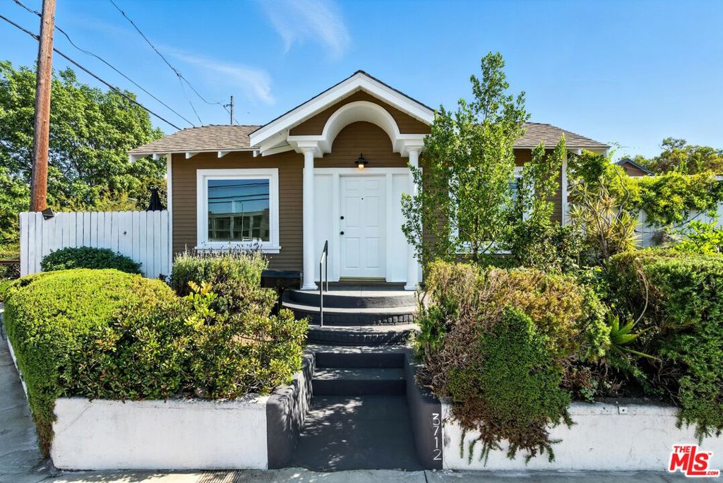 Welcome to 3712 E 10th Street a charming 1923 bungalow nestled in the vibrant Zaferia neighborhood of Long Beach. Perched above street level on a desirable corner lot, this home offers rare privacy and a front-row seat to the community's evolving green spaces.Right next door, the Greenbelt provides a peaceful walking path and a glimpse into the city's future plans for enhanced outdoor spaces. Directly across the street, the Long Beach Organic Community Garden invites you to join the neighborhood culture, reserve your own plot and become part of something special.Inside, you'll find a bright and inviting 750 sq ft layout with large modern windows that frame the lush greenery surrounding the home. Updated plumbing, a tankless water heater, and newer dual-pane windows add comfort and efficiency. When you return from the beach, rinse off in the upgraded shower and unwind on your private, greenery-enclosed patio.For those dreaming of expansion, the attic offers a great opportunity to build out additional living space or a bonus room. Located east of Redondo and south of Anaheim blvd, you're perfectly situated in one of Long Beach's most eclectic and emerging communities just minutes from the beach, Retro Row, local breweries, artisan coffee shops, and an exciting culinary scene.Experience the best of Long Beach living coastal charm, creative energy, and a true sense of community all wrapped up in this cozy corner-lot bungalow.