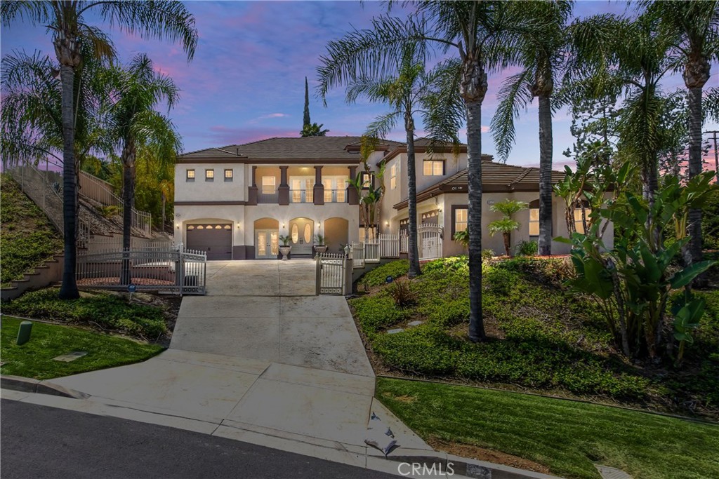 Stunning Custom Estate with Resort-Style Backyard
Welcome to your dream home! This beautifully maintained 4,650 sq. ft. custom estate sits on a private half-acre lot behind an electric gated entrance, offering the perfect blend of luxury, privacy, and comfort.
Inside, you'll find 5 spacious bedrooms and 5 full bathrooms, each with walk-in closets, providing ample space for family and guests. The home features upgraded cabinetry, granite countertops throughout, new carpet, and fresh paint, making it truly move-in ready.
The gourmet kitchen is a chef’s dream with a new KitchenAid double oven, JennAir cooktop, wine cooler, trash compactor, walk-in pantry, and plenty of room to entertain. A full indoor laundry room adds everyday convenience.
Step outside and escape to your personal staycation haven—this backyard is designed for both relaxation and entertainment. Enjoy a gated Pebble Tec pool and spa with a new heater and pump, or unwind under the cabana, complete with a built-in BBQ, cabinetry, refrigerator, fireplace, and TV—perfect for hosting friends or cozy family nights.
Other highlights include a full security system with cameras, 3-car garage with built-in cabinets, storage racks, Tesla charging system, and attic storage. The professionally landscaped yard features full irrigation with drip lines, keeping everything lush with minimal effort.
This is more than just a home—it’s a lifestyle.