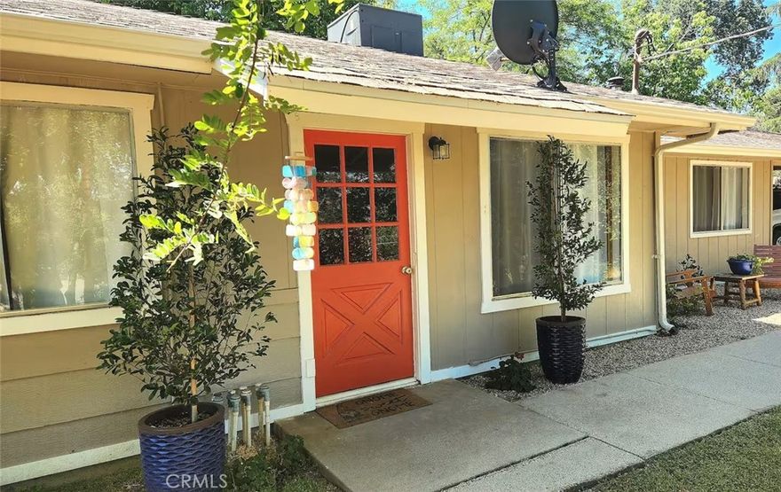 Check out this charming and move-in ready Oakhurst home, close to everything. Located just 20 minutes to the entrance of Yosemite National Park, 4 minutes to Oakhurst restaurants and shopping, and only 10 minutes to Bass Lake. This darling home features 3 bedrooms, 2 baths on over a quarter of an acre. The home has been updated and has a great open plan with an extra large great room that is open to the kitchen and dining area. In addition, it has an entry TV/gaming area that could be utilized in so many ways. The patio is your own oasis with a beautiful spa in a private setting. The home is currently operating as a vacation rental with great reviews. This is in a nice setting with trees and situated above and back from the street. There were numerous updates in 2016 including a new roof, HVAC system, updated flooring, updated appliances, water heater, updated lighting and septic system. Check out the photos and virtual tour to see why this one is worth a visit to see for yourself...