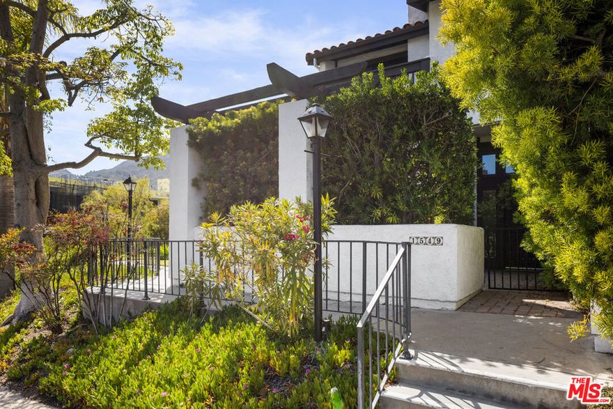 Welcome to this beautifully renovated corner townhome in the coveted Michael Lane Villas, where elegance, comfort, and privacy meet. Flooded with natural light and soaring ceilings, the home lives more like a single-family residence than a townhome. The expansive living room flows seamlessly into a spacious dining area perfect for entertaining while the private patio off the living room with a custom 10' sliding door invites barbecues and indoor/outdoor gatherings. The chef's kitchen has been fully reimagined with high-end appliances, custom cabinetry, and a charming breakfast nook with built-in window seating. Wide-plank hardwood floors, imported Spanish tile, and updated windows throughout highlight mountain views and create a warm, inviting atmosphere throughout.Upstairs, both bedrooms feature en suite baths. The primary suite offers stunning mountain vistas, a cozy fireplace, and a generous walk-in closet. The oversized second bedroom easily accommodates a king bed ir two doubles, making it ideal for guests, children, or a home office. An attached two-car garage provides direct access, abundant storage and closet spaces, and an EV charging plug. With its prime corner location, meticulous upgrades, and thoughtful layout, this turn-key home presents a rare opportunity in the sought-after Palisades Highlands.