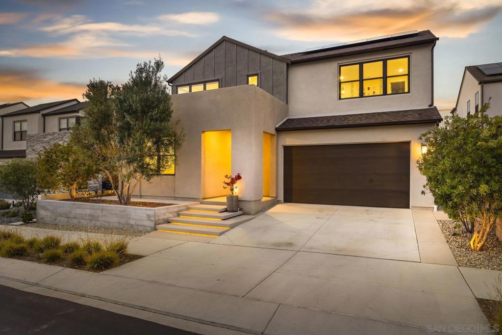 Welcome to this beautifully upgraded 2023-built canyon view home in the desirable Sendero Collection of Pacific Highlands Ranch. This modern residence offers 4.2kW owned solar, a Tesla charger, and a spacious 3-car tandem garage. Enjoy the relaxing hot tub, low-maintenance turf yard, and drought tolerant landscaping. The expansive open-concept main floor is designed for entertaining, featuring a chef’s dream kitchen with an oversized island, Monogram appliances, LG refrigerator, and a massive walk-in pantry. The first floor also includes a private en-suite bedroom and a convenient powder room. Upstairs, retreat to the luxurious primary suite with dual walk-in closets, a spa-inspired bathroom with a rain shower, soaking tub, dual vanities—including a sit-down vanity—and elegant finishes throughout. The second floor also includes two additional bedrooms and baths, a spacious media/bonus room, and a dedicated laundry room. First floor open air interior courtyard! This exceptional home blends comfort, style, and functionality—don’t miss the opportunity to make it yours! Highly desirable school district and within walking distance to Pacific Trails Middle School and nearby Solana Santa Fe Elementary School. Access to West Highlands Pacific Recreation Center.
