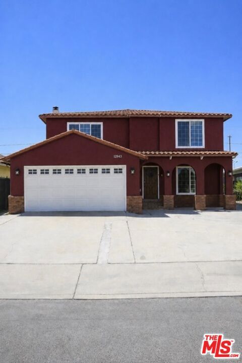 Photo of 15513 S Tarrant Avenue, Los Angeles, CA 90220 (MLS # 26834609)