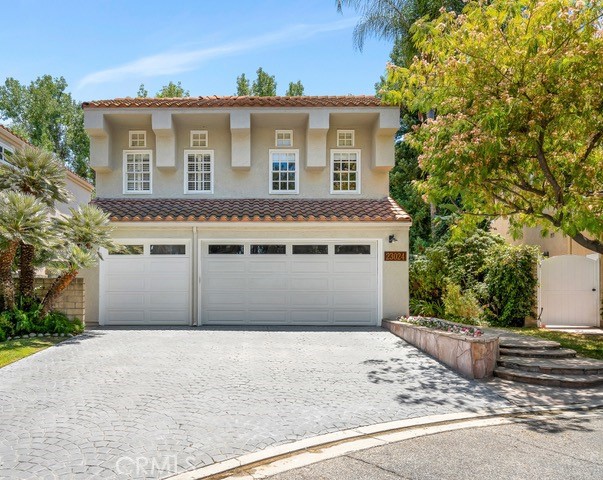 Stunning Calabasas Home with Private Pool on a Prime Cul-de-Sac Lot. Nestled on one of the most desirable streets in the exclusive gated community of Creekside, this beautifully updated home offers privacy, comfort, and luxury. Located on a quiet cul-de-sac, the property features its own resort-style beach entry pool and a serene backyard with a private patio—perfect for entertaining or relaxing. Step inside to discover a completely remodeled gourmet kitchen, completed within the past year, featuring premium finishes and modern appliances. The open-concept layout connects the kitchen seamlessly to both the family room and the dining area, creating a warm and inviting atmosphere for gatherings. The spacious living room is highlighted by soaring ceilings and a cozy fireplace, adding character and charm to the main living space. Upstairs, you'll find a luxurious primary suite with vaulted ceilings, a soaking tub, and a separate shower. Two additional generously sized bedrooms plus an office provide ample space for family or guests. This exceptional property combines the tranquility of cul-de-sac living with the benefits of a gated community and top-tier upgrades.. A must-see for anyone seeking an elegant and functional home in the heart of Calabasas. Located in the one of the best school districts, walking distance from the Commons and farmers market.