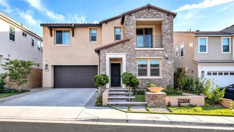 Photo of 21304 Wildflower Way, Chatsworth, CA 91311 (MLS # SR26187067)