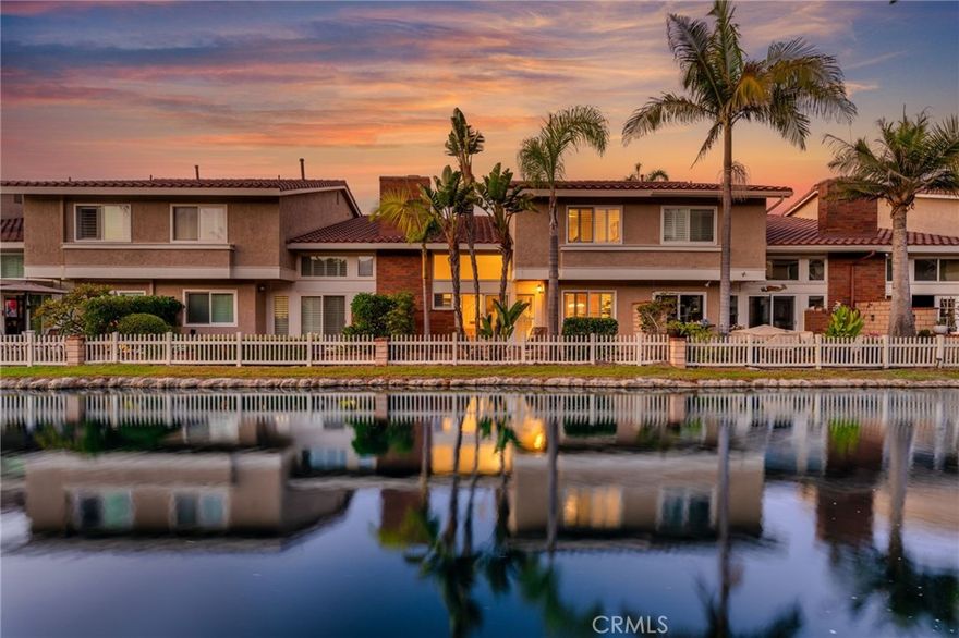 Discover the allure of coastal living at 7826 Sailboat Circle. Nestled within the charming, gated community of Seaside Village, this residence offers the perfect blend of relaxation and convenience, just moments from the beach, downtown, Pacific City, shopping, dining and more. Unwind in the inviting living room, with high ceilings, a cozy fireplace and breathtaking waterway views. The south-facing patio offers a tranquil spot for reading, entertaining, or simply soaking in the picturesque surroundings Featuring two spacious primary suites, each equipped with its own ensuite bathroom and walk-in closet, this townhome provides ample space for comfort and privacy.. With an attached two-car garage with direct access and ample driveway space, parking and storage are effortless. Community amenities include gated access, tennis courts, a sport court, pool, spa, a clubhouse, and a sprawling greenbelt.