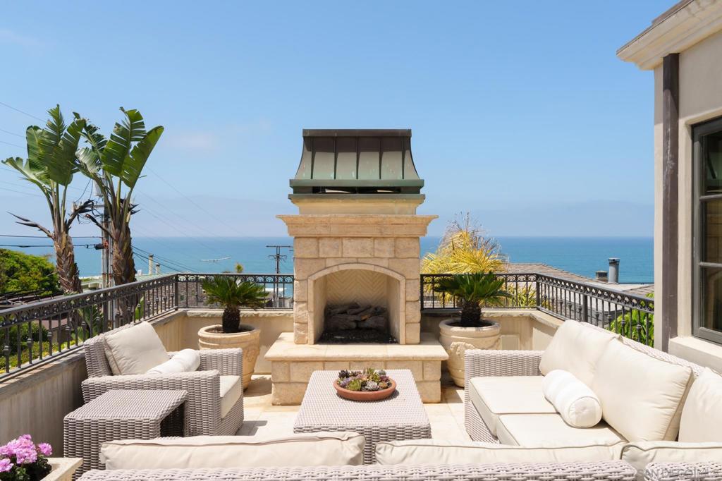 With sweeping ocean views that stretch beyond La Jolla, this elegant tri-level villa offers 3 bedrooms, 3.5 bathrooms, and a converted one-car garage transformed into a cozy, heated flex space—ideal for a home office or guest room, complete with a fold-out Murphy bed. Step through ultra-private, gated stone and stucco entrances into a warm Tuscan-inspired retreat. The interior is rich with character, featuring handcrafted tile, distressed Hickory wood floors, and exposed wood ceiling beams. The main level is an entertainer’s dream, with a spacious great room that seamlessly connects the gourmet kitchen, living, family, and dining areas. Framed by custom windows and French doors, the space is constantly filled with ocean breezes, the soft sound of waves, and abundant natural light. The kitchen blends beauty with function, offering large island counters with prep sinks, bar seating, and stylish cabinetry with ample storage. Elegant touches like recessed and chandelier lighting, a custom fireplace, and a luxurious powder room complete this floor. Upstairs, the primary suite is a private sanctuary with a massive sun deck boasting panoramic views, an outdoor fireplace, and generous lounging space. The spa-like en-suite bath features a double vanity, walk-in glass shower with mosaic marble tile, a juliet balcony, and custom windows framing Pacific Ocean views. A spacious walk-in closet with built-ins and natural light completes the space. The lower level—despite being partially below grade—feels bright and welcoming. It includes two bedrooms, two bathrooms, a large media room The lower level—despite being partially below grade—feels bright and welcoming. It includes two bedrooms, two bathrooms, a large media room, wet bar, and a full-size laundry room with extensive cabinetry and counter space. Step out to the home's private backyard where you’ll find a lush California dreamscape; new green grass lawn with stepping stone pavers, manicured landscaping, a charming pool, and multiple semi-covered seating areas. Overhead heaters, built-in BBQ kitchen, and a boutique-hotel vibe make this the perfect setting for alfresco dining or laid-back lounging. Located just moments from Powerhouse Park, The Del Mar Plaza, The Del Mar Racetrack, Torrey Pines, and top-rated schools—with the beach and dog park just steps away—this home offers a rare blend of refined living and relaxed coastal lifestyle. Your new memories, your new lifestyle, and your new address awaits. Welcome home.